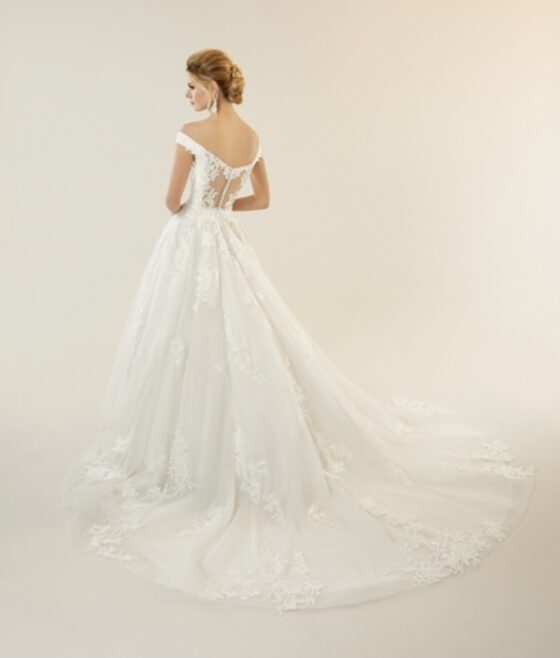 Gorgeous wedding dress with illusion back and lace train